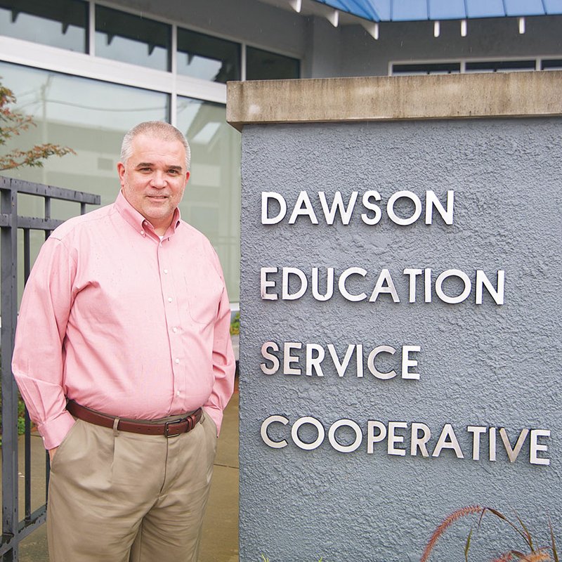 Darin Beckwith is the new director of the Dawson Education Cooperative in Arkadelphia. He and his staff work with schools in 22 districts, providing them with a variety of training workshops and other services.