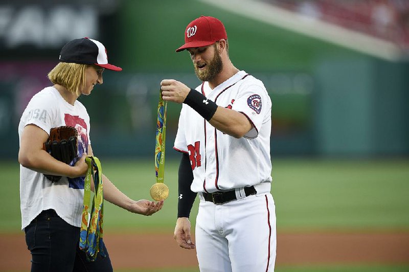 Katie Ledecky Throws First Pitch at Nationals Game