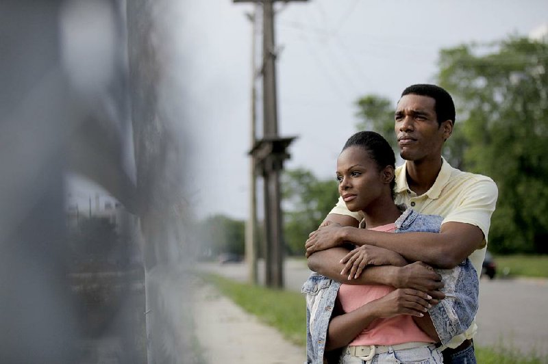 Barack Obama (Parker Sawyers) and Michelle Robinson (Tika Sumpter) kick around Chicago in the summertime in the romantic drama Southside With You.