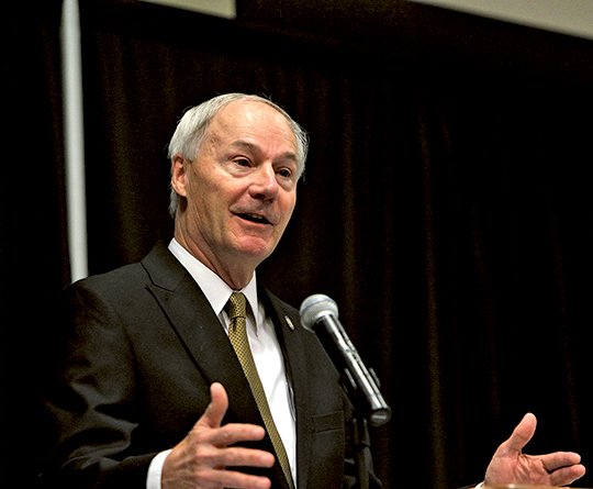 The Sentinel-Record/Richard Rasmussen OPPOSED: Arkansas Gov. Asa Hutchinson speaks to the Association of Arkansas Counties' 48th annual Conference at the Hot Springs Convention Center Thursday about initiatives on the November ballot.