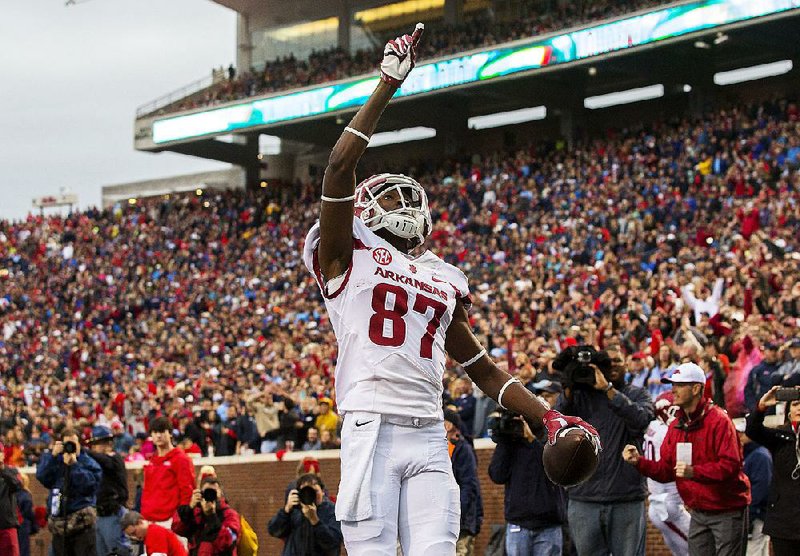 NWA Democrat-Gazette/JASON IVESTER 
Arkansas @ Ole Miss football
Arkansas wide receiver Dominique Reed celebrates after catching a pass in the end zone on Saturday, Nov. 7, 2015, during the second quarter against Ole Miss at Vaught-Hemingway Stadium in Oxford, Miss.