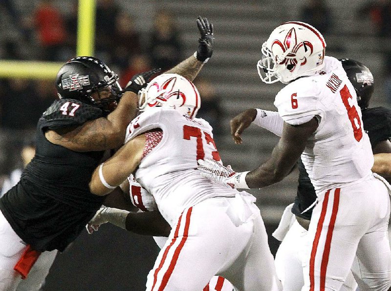 Arkansas State defensive lineman Robert Mondie (left) transferred to ASU last year from Alabama-Birmingham and contributed right away. The Red Wolves had the Sun Belt Conference’s most-improved run defense last season, allowing an average of 151.5 yards per game after giving up 205.2 in 2014. 
