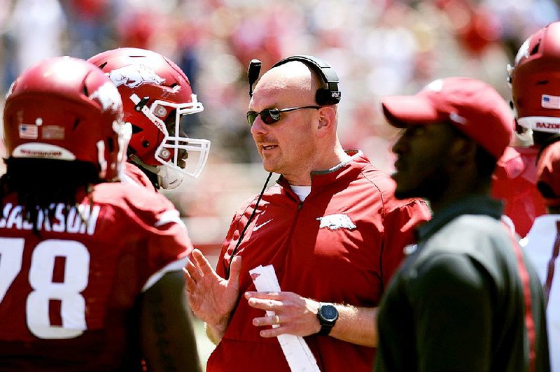 NWA Democrat-Gazette/ANDY SHUPE
Arkansas assistant coach Rory Segrest speaks to his defense Saturday, April 23, 2016, during the annual spring Red-White game in Razorback Stadium. Visit nwadg.com/photos to see more photographs from the game.
