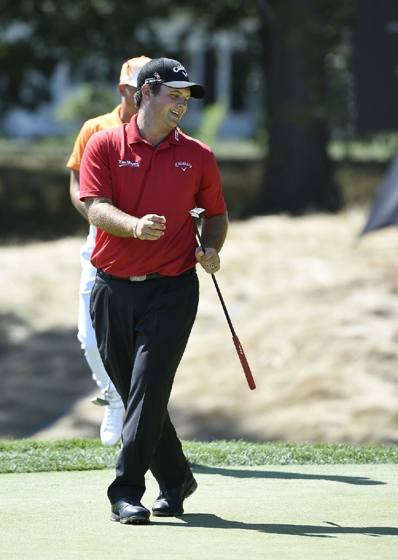 Patrick Reed reacts to a missed putt on the second green during the final round of The Barclays golf tournament in Farmingdale, N.Y., Sunday, Aug. 28, 2016. 