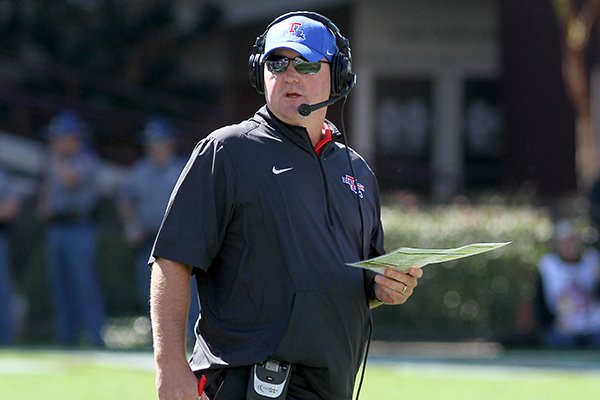 Louisiana Tech coach Skip Holtz, watches a video replay during the first half of a NCAA college football game against Mississippi State in Starkville, Miss., Saturday, Oct. 17, 2015. (AP Photo/Jim Lytle)

