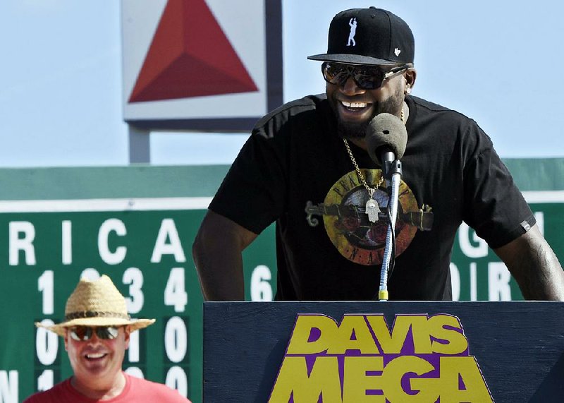 Boston Red Sox slugger David Ortiz talks to his fans during the unveiling of a corn maze in his likeness Tuesday in Sterling, Mass. The 8-acre maze was created by Davis Mega Maze and marks the first time the company has used a living celebrity in its maze. 