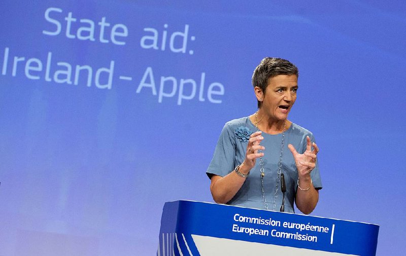 European Union Competition Commissioner Margrethe Vestager, speaking Tuesday at a news conference at EU headquarters in Brussels, said Ireland granted special tax breaks to Apple Inc. in exchange for basing EU operations there. “Member states cannot give tax benefits to selected companies — this is illegal under EU state aid rules,” Vestager said. 