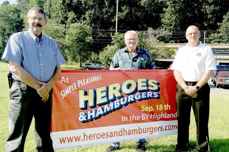 Photo submitted Ken Miner, center, founder of Heroes and Hamburgers, with Police Chief Ken Farmer, left, and Fire Chief Steve Sims. First Heroes and Hamburgers is scheduled for Sept. 18.