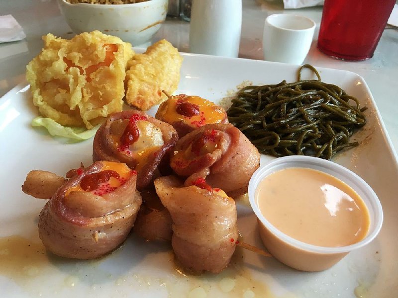 Bacon Wrapped Scallops come with tempura vegetables and green-tea soba noodles at Sekisui. 