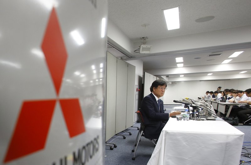 In this Aug. 2, 2016 file photo, Mitsubishi Motors Corp. Chairman Osamu Masuko attends a press conference at the headquarters of the automaker in Tokyo. 