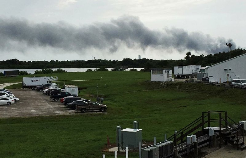 Smoke billows Thursday after an explosion at the SpaceX launch site in Cape Canaveral, Fla. 