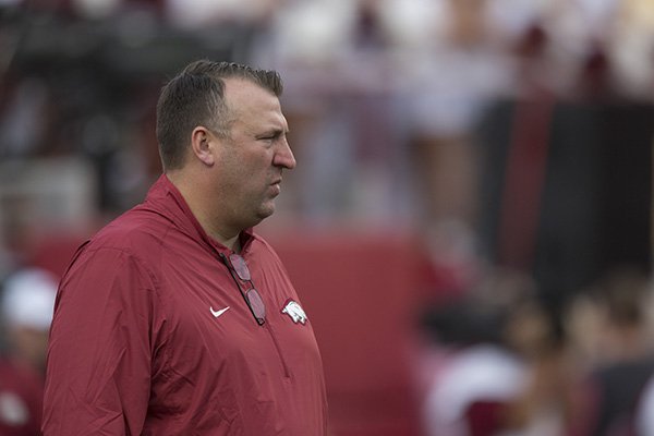 Arkansas coach Bret Bielema watches warmups prior to a game against Texas Tech on Saturday, Sept. 19, 2015, at Razorback Stadium in Fayetteville. 