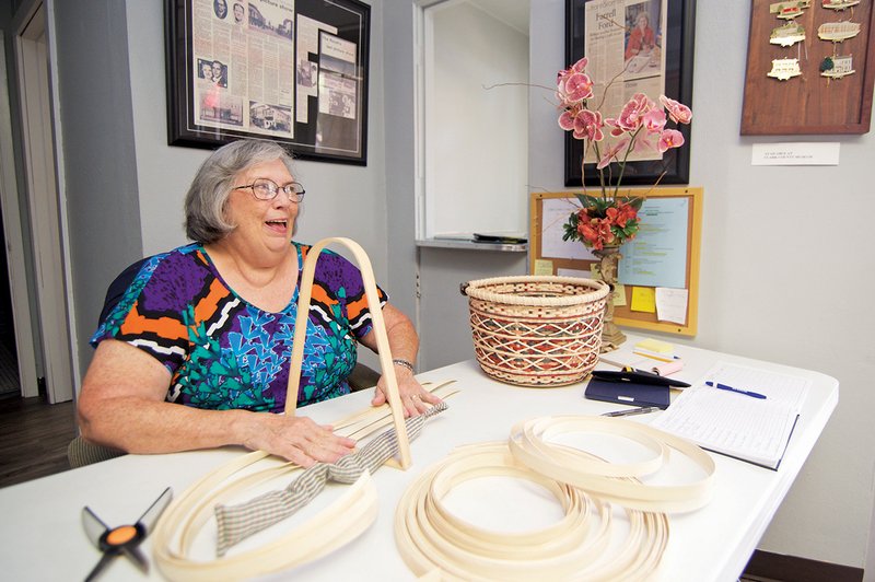 Rosie Huddleston of Arkadelphia has been making wooden baskets for 28 years. Samples of her work are included in the exhibit The Fine Art of Crafts: Showcasing Area Artisans that is open at the Arkadelphia Arts Center.