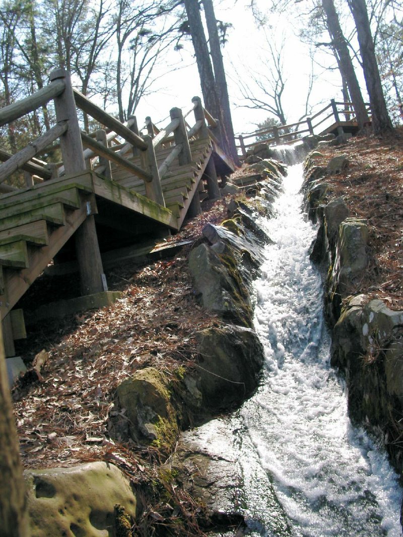 A man-made waterfall plunges toward Lake Ponder at Crowley's Ridge State Park near Paragould.
