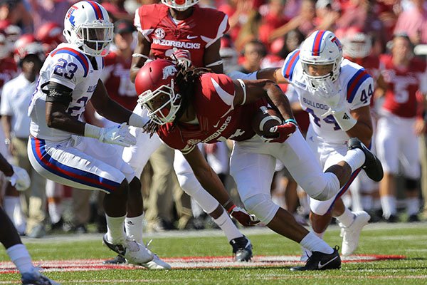 Arkansas receiver Keon Hatcher (4) runs after a catch during a game against Louisiana Tech on Saturday, Sept. 3, 2016, in Fayetteville. 