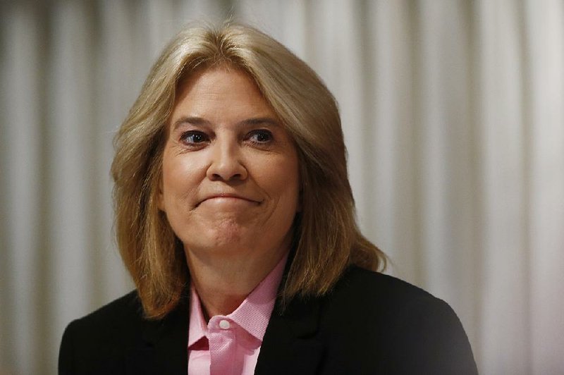 In a June 19, 2013 file photo, Greta Van Susteren of FOX News Channel listens as Gary Pruitt, President and Chief Executive Officer of the Associated Press, speaks at the National Press Club (NPC) in Washington.  