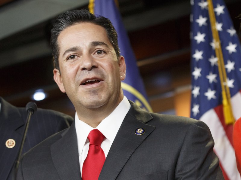 In this Nov. 17, 2014 file photo, Rep. Ben Ray Lujan, D-N.M. speaks during a news conference on Capitol Hill in Washington. 