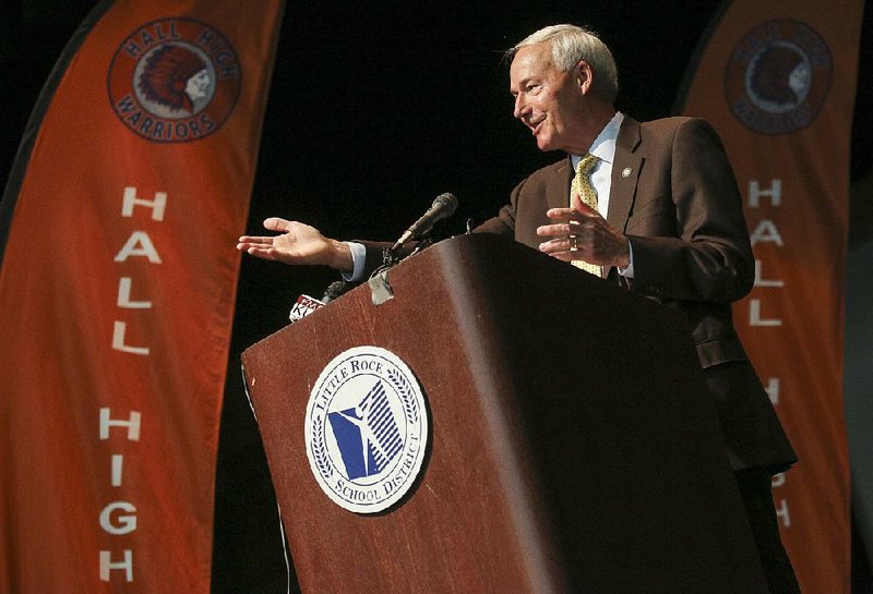 Gov. Asa Hutchinson announces plans for a statewide computer coding competition for high school students during a school assembly at Hall High School in Little Rock on Wednesday. 