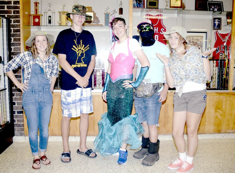 Photo by Rick Peck Spirit week Students at McDonald County High School are celebrating the school&#8217;s 2016 football homecoming this week. Tuesday was Back to the RiverDay, where students dressed like they were going to the river. Shown are, from left, Ragan Wilson, Bryan Rock, Aydan Hutchison, Izak Johnson and Saylor Jones.