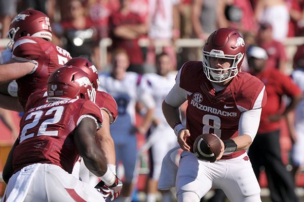 Arkansas quarterback Austin Allen (8) hands off to running back Rawleigh Williams (22) during a game against Louisiana Tech on Saturday, Sept. 3, 2016, in Fayetteville. 