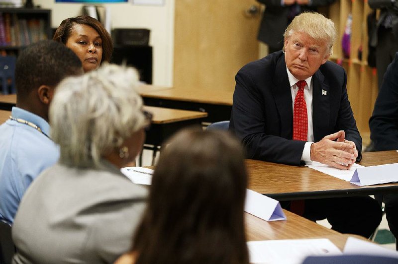 Donald Trump meets with students and educators before speaking about school choice Thursday at the Cleveland Arts and Social Sciences Academy in Cleveland.
