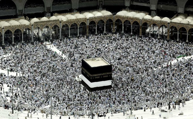 Muslim pilgrims gather for Friday prayers in front of the Kaaba, Islam’s holiest shrine, at the Grand Mosque in the holy city of Mecca, Saudi Arabia. 