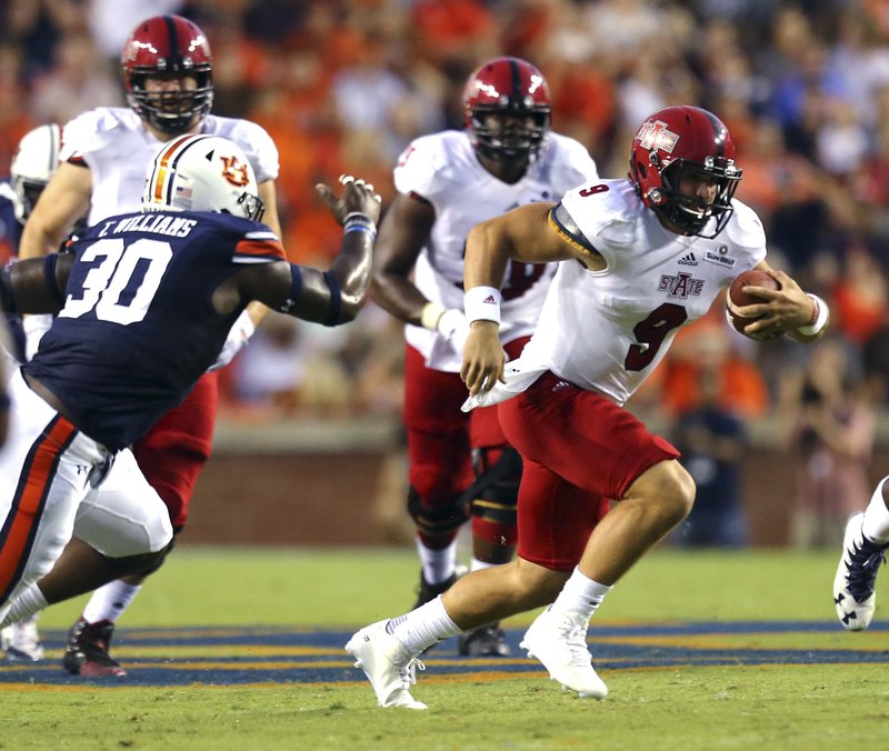 Arkansas State quarterback Chad Voytik (9) scrambles for yardage against Auburn during the first half of an NCAA college football game, Saturday, Sept. 10, 2016, in Auburn, Ala. (AP Photo/Butch Dill)
