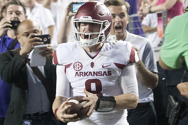 Arkansas junior quarterback Austin Allen (8) celebrates on Saturday, Sept. 10, 2016, with after catching a pass for a two-point conversion in the fourth quarter against TCU at Amon G. Carter Stadium in Fort Worth, Texas.