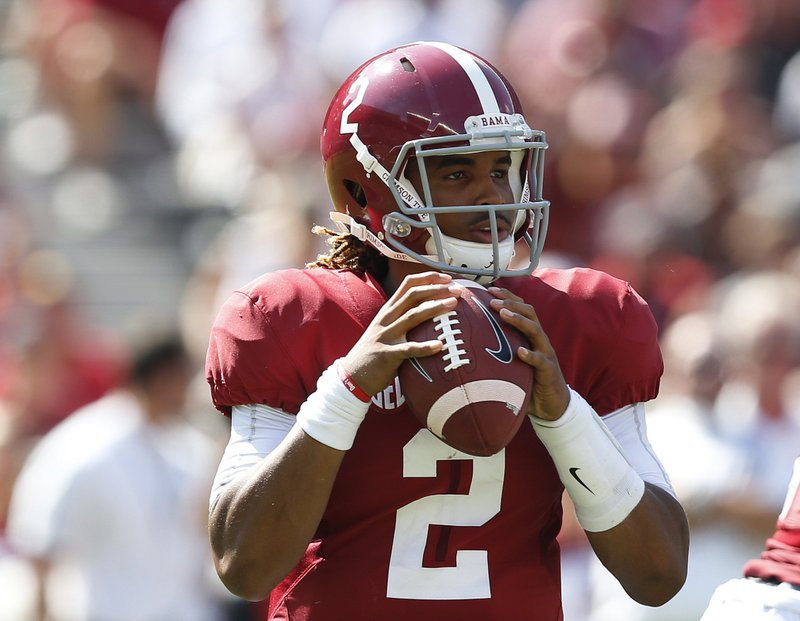 Alabama quarterback Jalen Hurts sets back to pass during the first half of an NCAA college football game against Western Kentucky, Saturday, Sept. 10, 2016, in Tuscaloosa, Ala. 