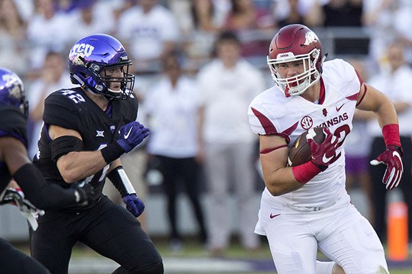 Arkansas freshman fullback Hayden Johnson carries the ball on Saturday, Sept. 10, 2016, against TCU at Amon G. Carter Stadium in Fort Worth, Texas.