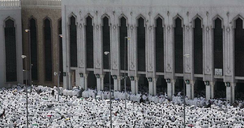 Muslims taking part in the hajj pilgrimage pray Sunday in Arafat near the holy city of Mecca, Saudi Arabia.

