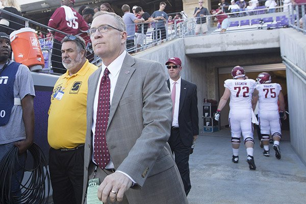 Arkansas athletics director Jeff Long walks onto the field prior to a game against TCU on Saturday, Sept. 10, 2016, at Amon G. Carter Stadium in Fort Worth, Texas. 