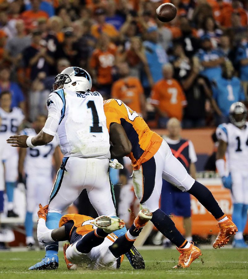 After hits like this from Denver free safety Darian Stewart (right) on Carolina quarterback Cam Newton on Thursday, members of the Broncos defense insisted Tuesday their hard-nosed style is above board. “We’re not malicious. We don’t intentionally go to hurt anybody. We just play hard. We play physical,” linebacker Todd Davis said.