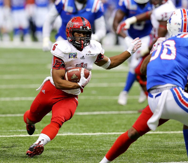 ASU running back Warren Wand (left), shown in last year’s New Orleans Bowl against Louisiana Tech, earned his first career start in Saturday’s loss at Auburn, but it appears it won’t be his last. Junior Johnston White watched the game in street clothes because of an injured hamstring, while junior Armond Weh-Weh tore his ACL in the first quarter and is out for the season.