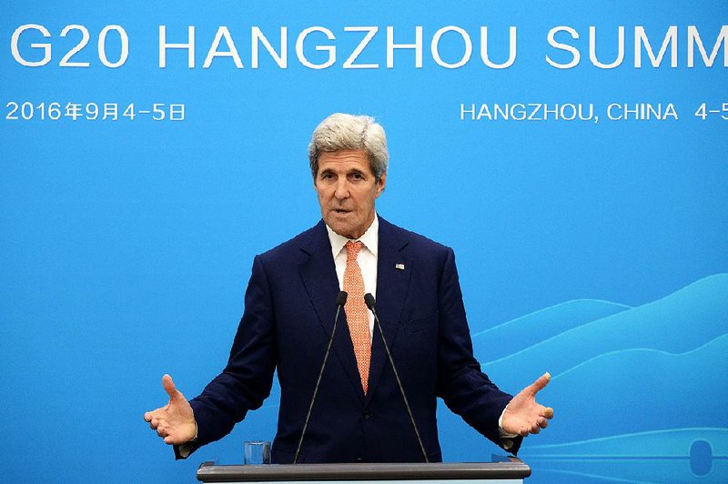 U.S. Secretary of State John Kerry speaks at a press conference in Hangzhou during the G20 Leaders Summit Sunday, Sept. 4, 2016. 