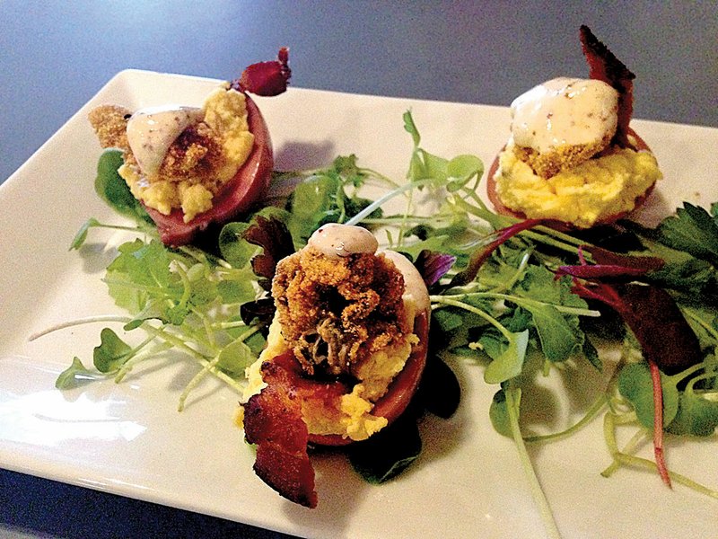 The tapas menu at Core Public House in North Little Rock is adventurous, featuring items such as Gulf Coast Deviled Eggs with each pickled egg topped with a fried oyster. 
