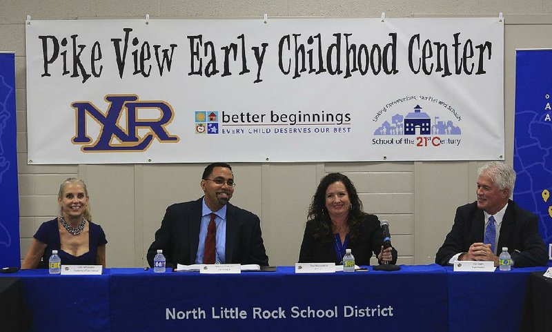 U.S. Education Secretary John B. King Jr. (second from left) participates in a panel discussion Thursday morning during a visit to Pike View Early Childhood Center in North Little Rock that included Jody Veit-Edrington (left), coordinator of early childhood programs for the North Little Rock School District, moderator Jamie Morrison Ward and Kelly Rodgers, superintendent of North Little Rock Schools (right), as well as parents and other officials. More photos are available at arkansasonline.com/galleries 