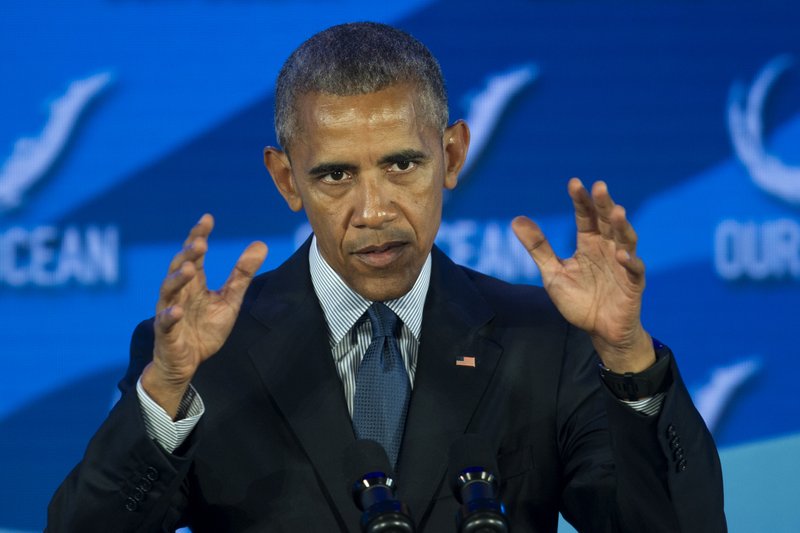 President Barack Obama gestures while speaking at the Our Ocean, One Future conference at the State Department in Washington, Thursday, Sept. 15, 2016. The conferences focus on marine protected areas, sustainable fisheries, marine pollution, and climate-related impacts on the ocean. (AP Photo/Cliff Owen)