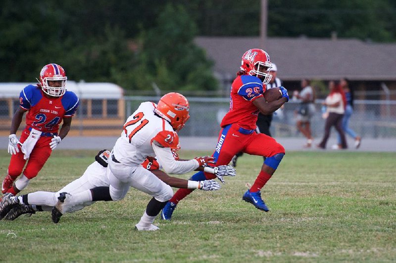 McClellan junior running back Tyrse Lair returns the opening kickoff for a touchdown against Hall High on Friday September 16, 2016