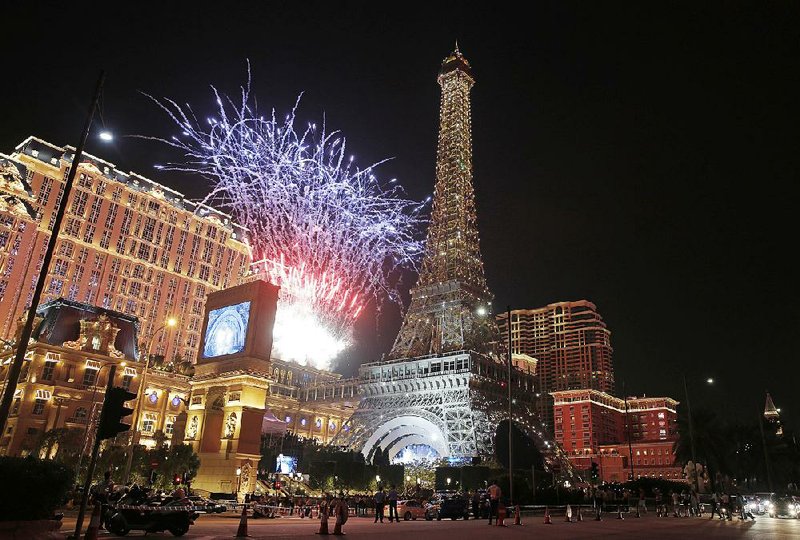 Fireworks explode at a replica of the Eiffel Tower at the Parisian Macao Hotel during an opening ceremony in Macau, China, last week.