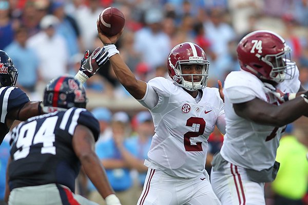 Alabama quarterback Jalen Hurts (2) fires a pass against Mississippi during their NCAA football game at Vaught-Hemingway Stadium in Oxford, Miss., Saturday, Sept. 17, 2016. Alabama won 48-43. (James Pugh/The Laurel Chronicle via AP)

