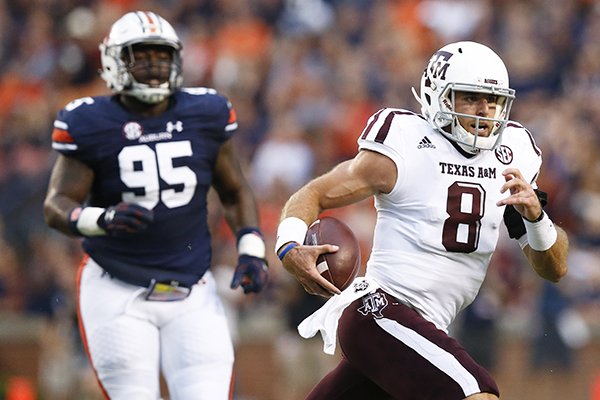 Texas A&M quarterback Trevor Knight runs the ball in the first half during an NCAA college football game against Auburn, Saturday, Sept. 17, 2016, in Auburn, Ala. (AP Photo/Brynn Anderson)

