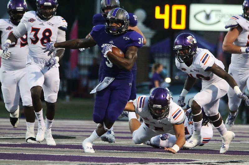 Central Arkansas running back Antwon Wells (34) rushed for 129 yards on 25 carries Saturday to help the Bears top Northwestern (La.) State 24-10 Saturday at Estes Stadium in Conway.