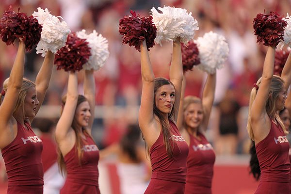 Arkansas pom squad members lead a Hog call during a game against Texas State on Saturday, Sept. 17, 2016, in Fayetteville. 
