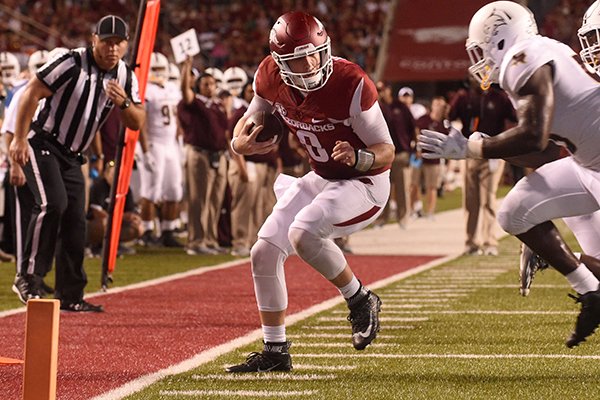 Arkansas quarterback Austin Allen carries the ball during a game against Texas State on Saturday, Sept. 17, 2016, in Fayetteville. 