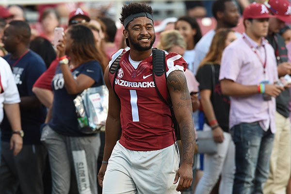 Arkansas receiver Jared Cornelius walks the field prior to a game against Texas State on Saturday, Sept. 17, 2016, in Fayetteville. 
