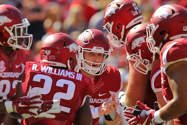 Arkansas quarterback Austin Allen talks in the huddle during a game against Louisiana Tech on Saturday, Sept. 3, 2016, in Fayetteville. 