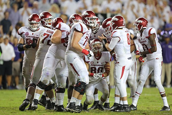 Arkansas players break the huddle during a game against TCU on Saturday, Sept. 10, 2016, in Fort Worth, Texas. 