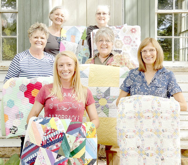 Photo submitted Winners in the Shiloh Museum&#8217;s 39th Ozark Quilt Fair. Front row, from left: Tiffany Bowen of Springdale and Marti Olesen of Ponca. Middle row, from left: Victoria Newman of Springdale and Jane Hammarstrom of Bella Vista. Back row, from left: Jan Murray Brown of Springdale and Mary Spilman of Yellville.