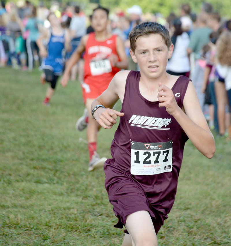 Graham Thomas/Herald-Leader Kerrig Kelly finished 17th overall and was the second-best finisher for Siloam Springs in the junior high boys division of the Panther Cross Country Classic.